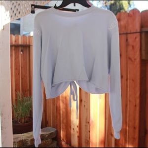 A baby blue crop top that fits all.